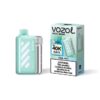 Mint green vape device with a removable silver cartridge beside its box, labeled VOZOL Vista 40000, Cool Mint (40K puffs).