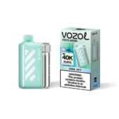 Mint green vape device with a removable silver cartridge beside its box, labeled VOZOL Vista 40000, Cool Mint (40K puffs).