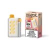 Vozol Vista 40000 disposable vape with white and yellow striped design beside its pink mango passion fruit box.