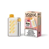 Vozol Vista 40000 disposable vape with white and yellow striped design beside its pink mango passion fruit box.