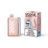 Pink VOZOL Vista 40000 disposable vape with matching box showing '40K puffs' and 'Peach Ice' flavor